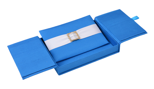 Royal blue gatefold silk invitation box with an embellished inner card panel