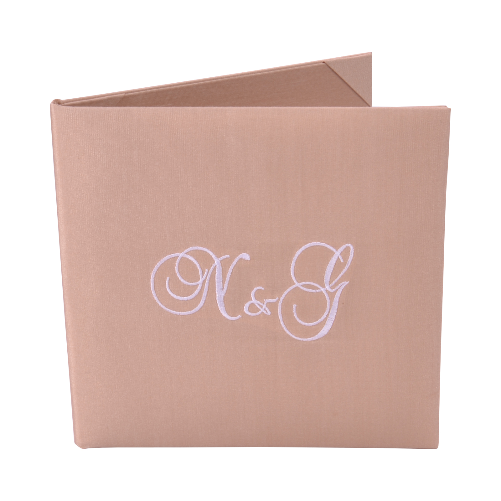 Champagne-toned silk book folio with pale embroidered initials, shown partly open