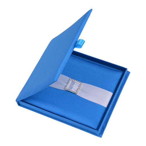Deep blue silk wedding invitation box with silver ribbon and jeweled embellishment for winter